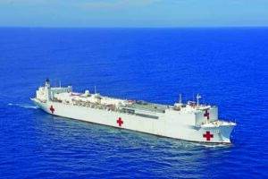 Coast Guard helicopter crew conducts overflights of USNS Comfort