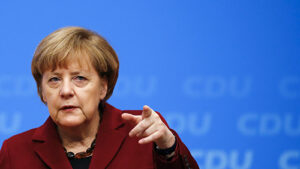German Chancellor and leader of the CDU Merkel gestures during the second day of the CDU party congress in Karlsruhe