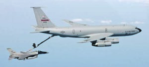FILE PHOTO -- A KC-135 Stratotanker refuels an F-16 Fighting Falcon.  Air Force Secretary Dr. James G. Roche concluded testimony before the Senate Armed Services Committee on Sept. 4.  He answered questions about the 2004 Air Force Tanker Lease Proposal, which would replace ageing KC-135s leased KC-767s.  (U.S. Air Force photo by Tech. Sgt. Mike Buytas)