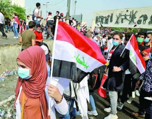 Students take part in anti-government protests in Baghdad, Iraq, Monday, Oct. 28, 2019. Protests have resumed in Iraq after a wave of demonstrations earlier this month were violently put down. (AP Photo/Hadi Mizban)