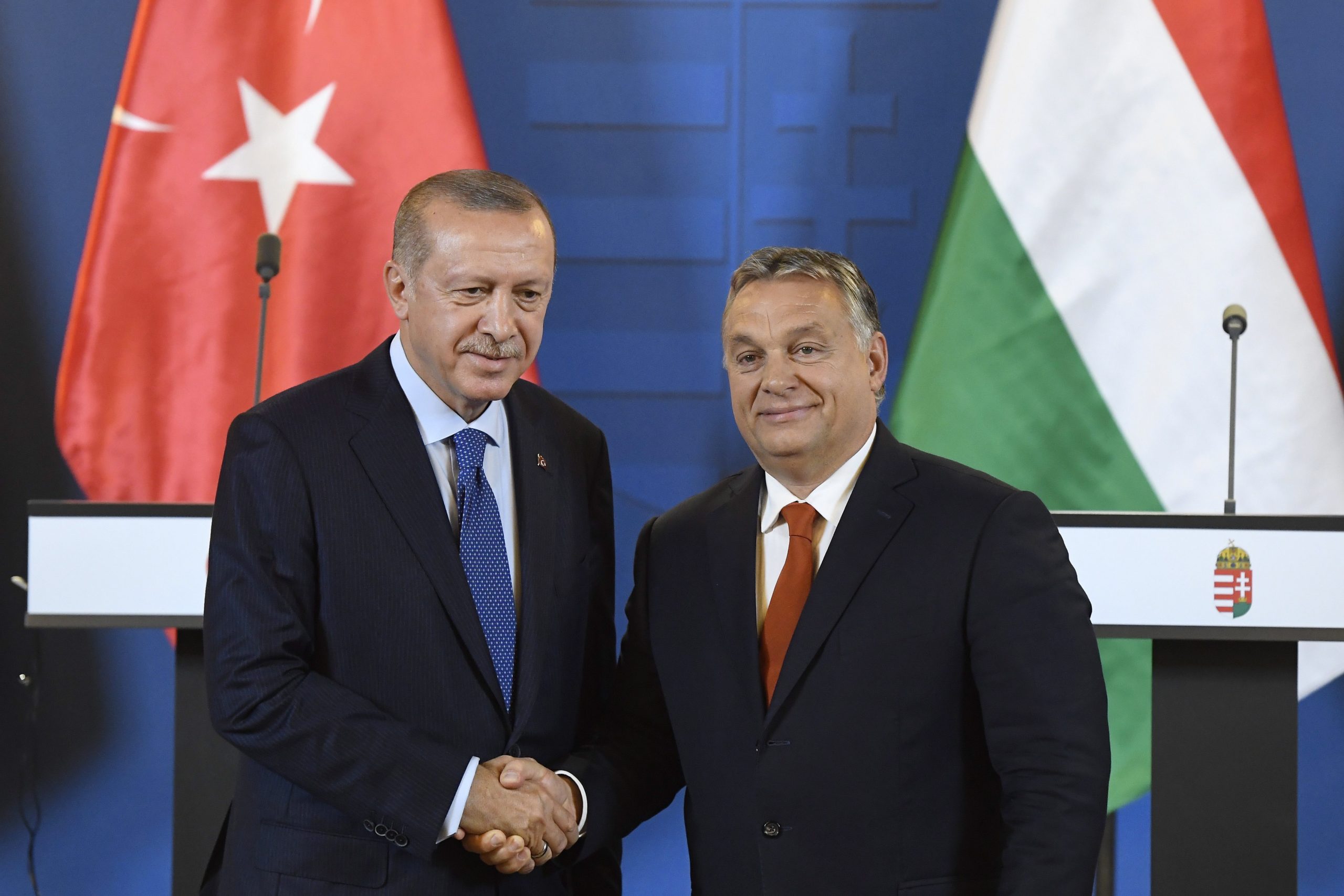 Turkish President Recep Tayyip Erdogan (L) and Hungarian Prime Minister Viktor Orban shake hands during the joint press conference following their meeting in the Parliament building in Budapest, Hungary, 08 October 2018. Erdogan is paying a two-day official visit to Hungary.  EPA/SZILARD KOSZTICSAK HUNGARY OUT