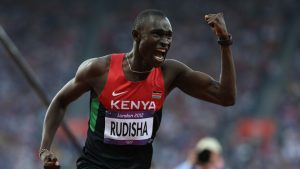 LONDON, ENGLAND - AUGUST 09:  David Lekuta Rudisha of Kenya celebrates after winning gold and setting a new world record in the Men's 800m Final on Day 13 of the London 2012 Olympic Games at Olympic Stadium on August 9, 2012 in London, England.  (Photo by Streeter Lecka/Getty Images)