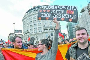 People wave Macedonian flags during a protest in a central square in Skopje on March 4, 2018.  Right-wing and diaspora organizations protested against a possible compromise with Greece on the country's name  which they say would damage the national interest. / AFP PHOTO / Robert ATANASOVSKI        (Photo credit should read ROBERT ATANASOVSKI/AFP/Getty Images)