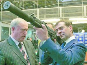 epa01260418 Russian First Deputy Prime Minister and presidential candidate Dmitry Medvedev (R) holds a Kalashnikov gun as Vladimir Grodetsky (L), General Director of the IZHMASH plant, the largest firearms producer in Russia, looks on at the IZHMASH plant in the central Russian city of Izhevsk, about 1,000km east of Moscow, 19 February 2008. Presidential elections in Russia are set on March 02. EPA/DMITRY ASTAKHOV - POOL - armymedia.bg epa01260418 Russian First Deputy Prime Minister and presidential candidate Dmitry Medvedev (R) holds a Kalashnikov gun as Vladimir Grodetsky (L), General Director of the IZHMASH plant, the largest firearms producer in Russia, looks on at the IZHMASH plant in the central Russian city of Izhevsk, about 1,000km east of Moscow, 19 February 2008. Presidential elections in Russia are set on March 02. EPA/DMITRY ASTAKHOV - POOL